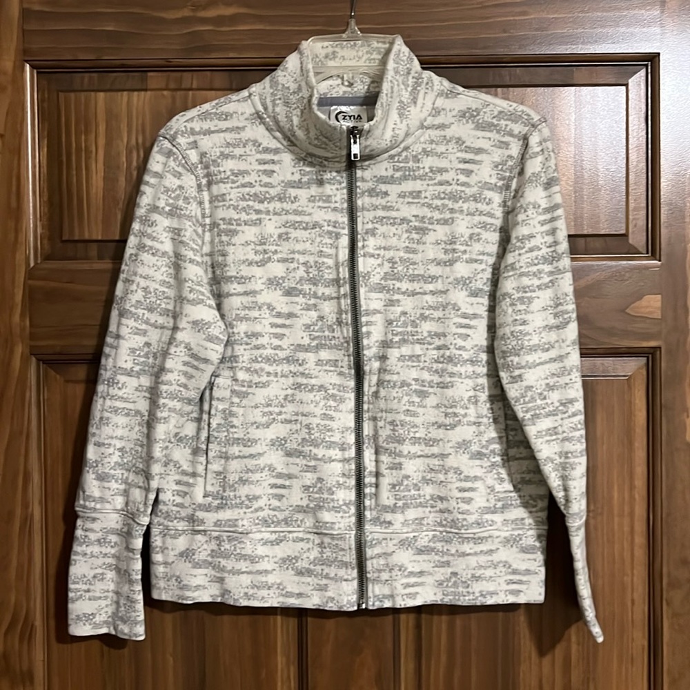 Zyia zip up jacket. NWOT. Size medium.